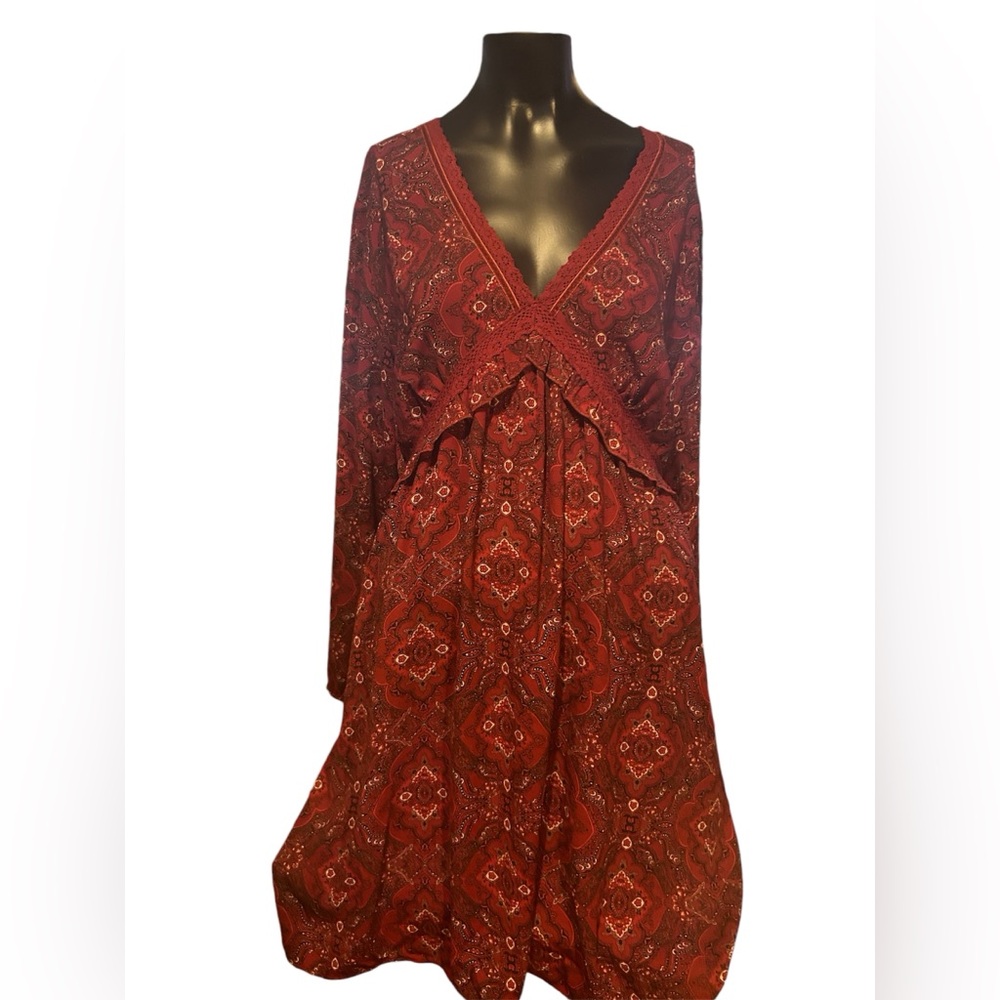 Maurice’s red and paisley print long sleeve dress. Tie back and ruffles top